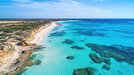 Stunning coastal scenery of a pristine beach with turquoise waters.