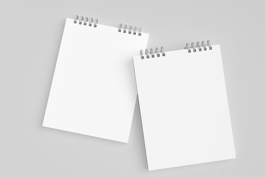 Blank realistic 2 spiral bound notepad, or binder book for mockup on light grey background. High resolution.