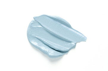 A sample of cosmetic clay for a body or face mask. White background