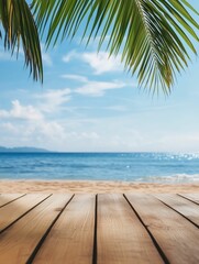 Fototapeta premium A wooden table top rests empty, providing a perfect viewpoint of a tranquil tropical beach. Gentle waves lap against the shore under a bright blue sky.