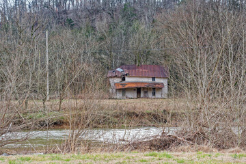 Abandoned homestead along a creek