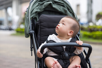 Baby in Stroller for Walk Through City Streets