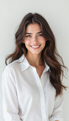 Joyful young Afro-American woman in vibrant dashiki with afro and warm smile on white.

