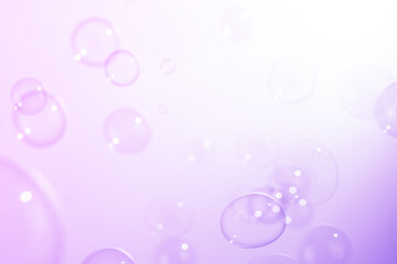 Beautiful Purple Soap Bubbles Floating in The Air. Celebration Festive Backdrop. Freshness Soap Suds Bubbles Water. Purple and White Gradient Textured. Abstract Background.