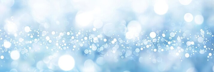 Sparkling snowflakes gracefully fall against a vivid blue backdrop.