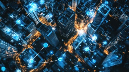 High-angle view of a city at night, interconnected by a network.