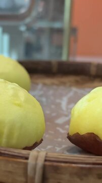 Bao bun in plastic container. Asian street food concept