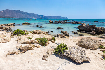 View of the famous Elafonisi beach with the turquoise waters and the pink sand ,in Chania, Crete, Greece.