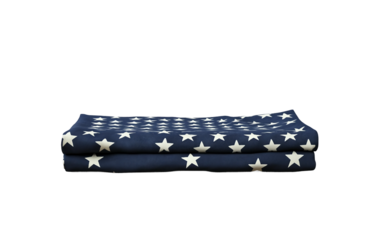 Intimate image of a carefully folded American flag placed on a wooden table, representing a tribute to those who served and the values of freedom isolated on white background PNG
