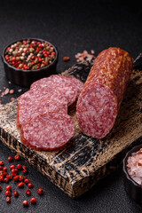 Sliced salami sausage, smoked meat, delicious deli snacks