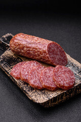 Sliced salami sausage, smoked meat, delicious deli snacks