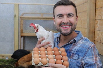 Man holding bio egss and a cute hen 