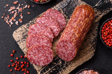 Sliced salami sausage, smoked meat, delicious deli snacks