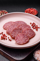 Sliced salami sausage, smoked meat, delicious deli snacks
