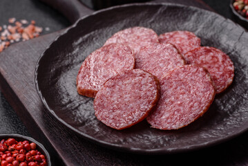 Sliced salami sausage, smoked meat, delicious deli snacks