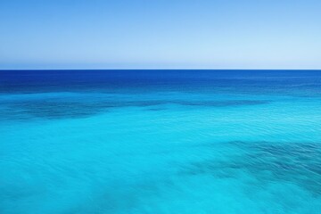 Obraz premium Tranquil Turquoise Ocean and Clear Blue Sky Seascape