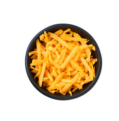 black ceramic bowl with grated cheddar cheese isolated on a white background, top view.