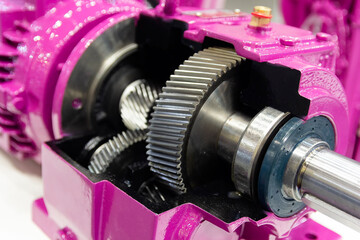 Gearbox on large electric motor at industrial equipment plant close-up