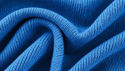 Blue fabric with a distinct texture and pleats. You can see how knitted or crocheted fabric creates a feeling of softness, warmth and coziness
