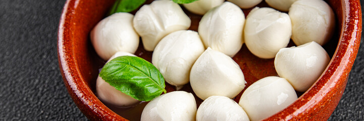 Mozzarella mini cheese balls dish fresh delicious gourmet food background on the table rustic food top view copy space