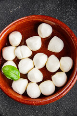 Mozzarella mini cheese balls dish fresh delicious gourmet food background on the table rustic food top view copy space