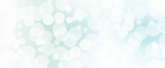 Beautiful blue soap bubbles float as background. Dreamy soft focus wallpaper backdrop. Light blue diffuse glowing floating holiday circle dots pattern. 3d rendering.	
