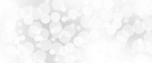 Beautiful light grey soap bubbles float as background. Dreamy soft focus wallpaper backdrop. Light grey diffuse glowing floating holiday circle dots pattern. 3d rendering.	