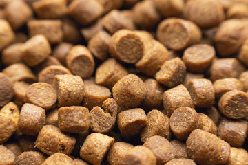 Dry pet food, for cats or dogs. Background texture