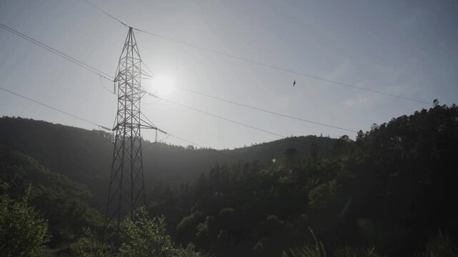 Silhouetted Medium Voltage Power Line Tower at Sunset &ndash; D-Log Profile - 1523
