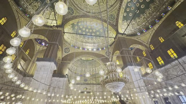 Capture the illuminated interior of Mohammed Ali Mosque, with its alabaster glow and Cairo Citadel view. Perfect for projects highlighting Islamic architecture and art.