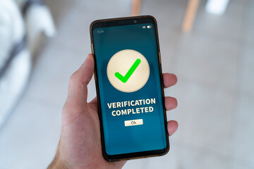 Verification completed notification on smart phone.