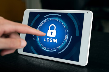 Login to private device concept. Hand touching lock icon to access private tablet.