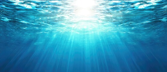 Vantage Depression Rays concept. Bright sunlight filters through shimmering blue ocean water, creating a tranquil underwater scene.