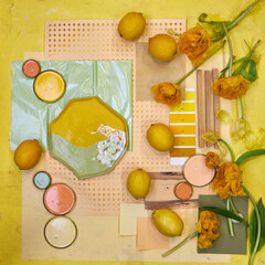 Color palette mood board in yellow and peach tones with lemons and floral decoration