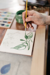 hand of artist painting