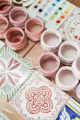 Painting tile in a workshop