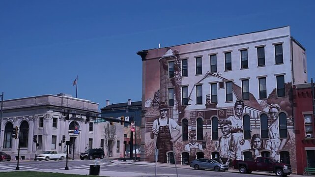 Heritage Harvesters mural in downtown Wilmington, Ohio USA 2024. A tribute to local farmers. Painted by artist Jason Morgan	