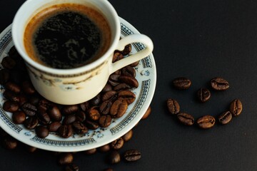 cup of coffee with beans