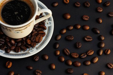 cup of coffee with beans