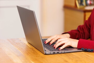 young woman working on laptop