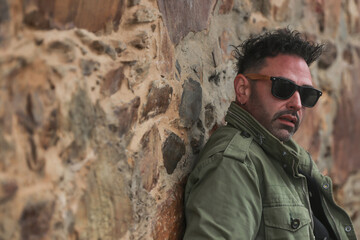 portrait of a man outdoors on a trip or rural tourism