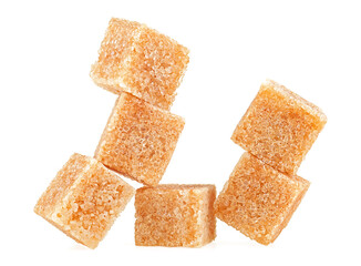 Brown cane sugar cubes isolated on a white background. Pieces of cane sugar.