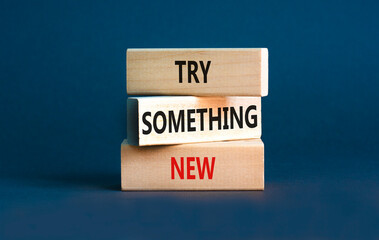 Try something new symbol. Concept words Try something new on beautiful block. Beautiful grey table grey background. Business motivational lifestyle try something new concept. Copy space.