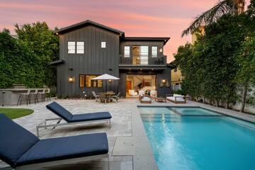 Modern luxury estate with sunset views, designer interiors, outdoor pool, gourmet kitchen