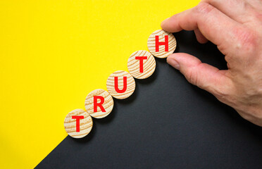 Truth symbol. Concept word Truth on beautiful wooden circles. Beautiful yellow and black...