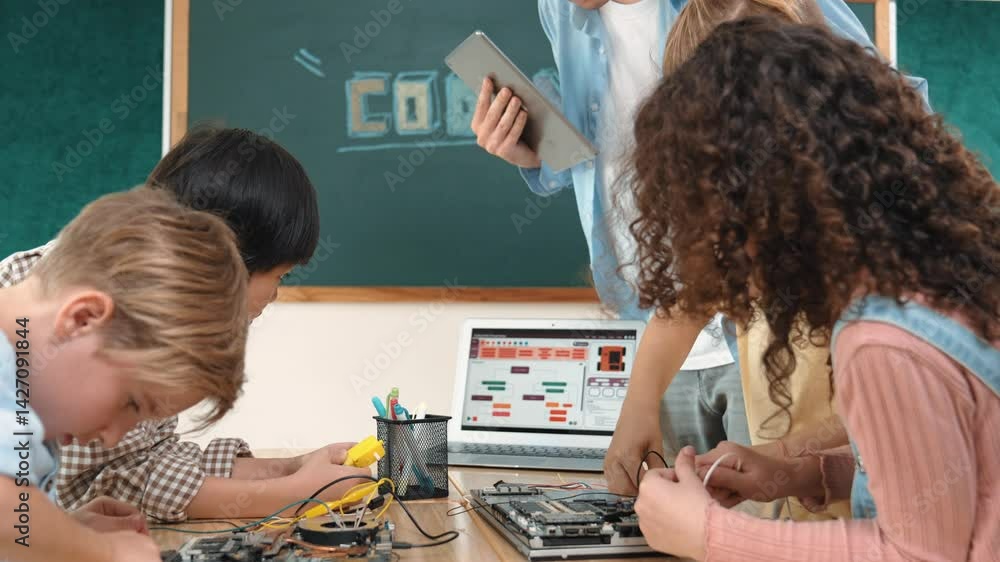Poster group of diverse student working together on main board with laptop screen display engineering promp
