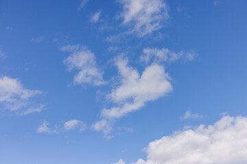 Fototapeta premium Bright Blue Sky With White Clouds Over BC, Canada