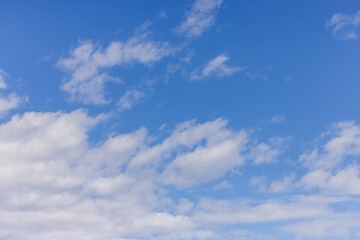 Obraz premium Bright Blue Sky with Fluffy Clouds Over BC, Canada