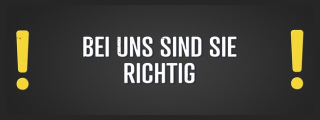 Fototapeta premium Bei uns sind Sie richtig (You've come to the right place) - A blackboard illustration with white text.