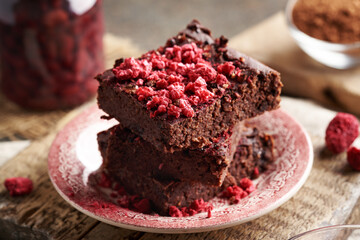 Homemade gluten-free brownies made with red kidney beans, oat flakes and chocolate